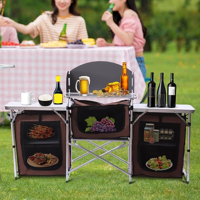 Camping Kitchen Table, Brown Aluminum Portable Folding Camp Cook Station, Outdoor Cooking Table with Windscreen and 3 Storage Cupboards for Picnic and BBQ