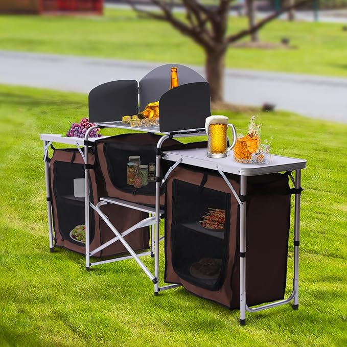 Camping Kitchen Table, Brown Aluminum Portable Folding Camp Cook Station, Outdoor Cooking Table with Windscreen and 3 Storage Cupboards for Picnic and BBQ